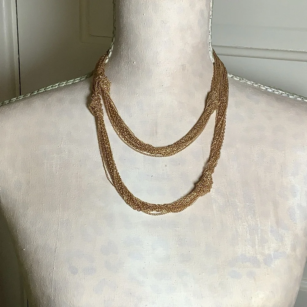 EL by Erica Lyons Gold Tone Long Knotted Statement Necklace 41-45 Inches Adjust